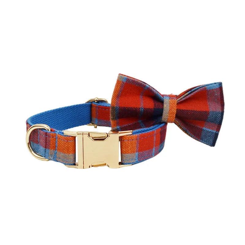 Blue velvet plaid pattern dog collar and matching hand-holding rope leash on a white background.