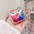Personalised graffiti TPU earphone protective cover for AirPods 1, 2, Pro, 3 in jigsaw puzzle colour and smiling face designs.
