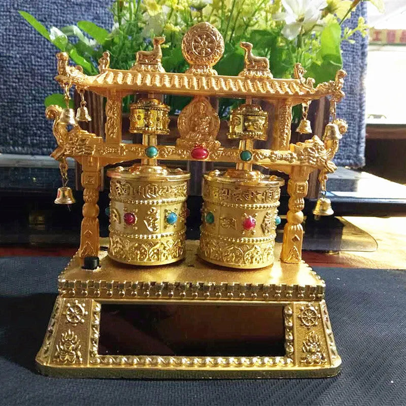 Traditional Chinese alloy prayer wheel car accessory with rotating mechanism, dimensions 12x15x8cm