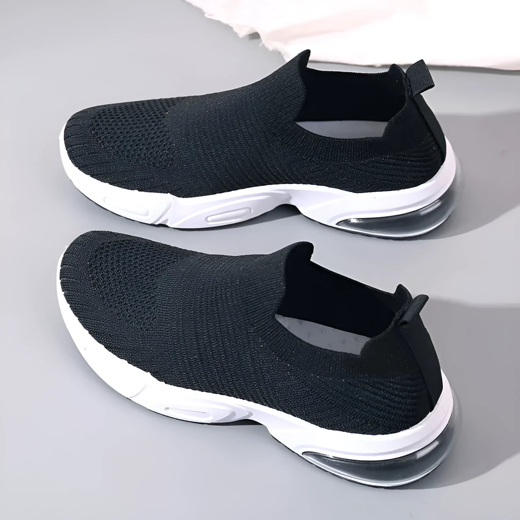 Slip-on sock shoes with mesh lining and PVC sole in black, white, pink, and khaki colours