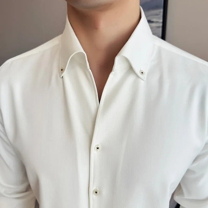 Men's slim fit long-sleeved denim shirt in solid colour on a hanger