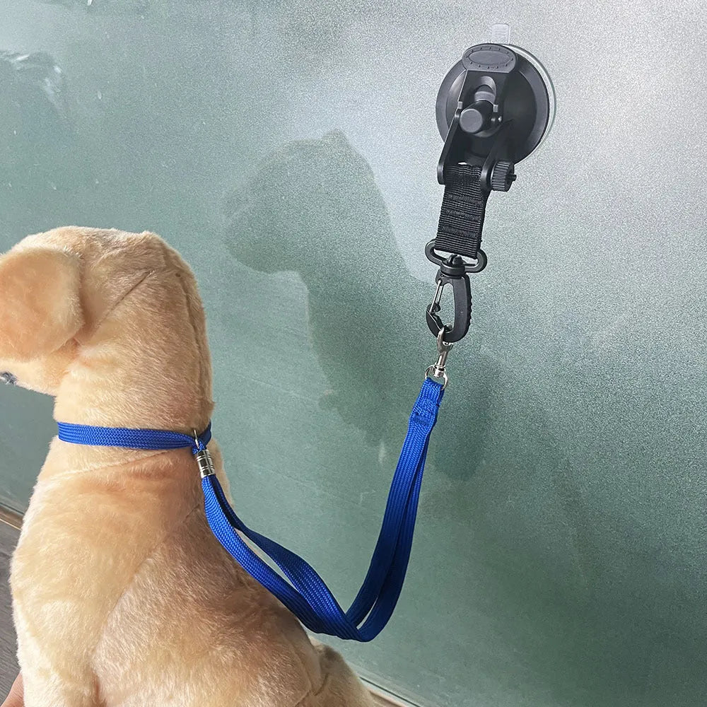 Pet bathing fixed artifact with suction cups, traction rope, and handcuffs for securing pets during washing