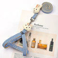 Small dog harness with quick-release buckles and adjustable straps in blue, khaki, orange, pink, or red.