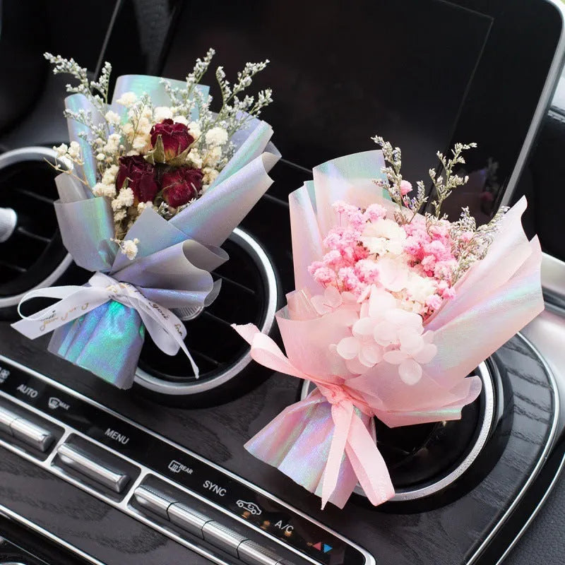 Car aromatherapy vent perfume with dried flower ornament measuring 10cm in various colours