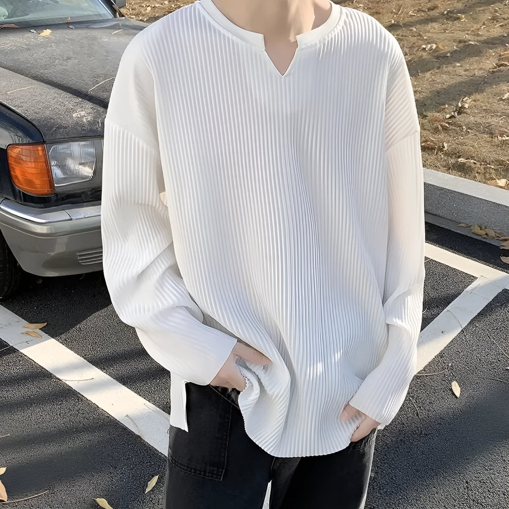 Plus size striped pullover in loose fit with long sleeves and draping design