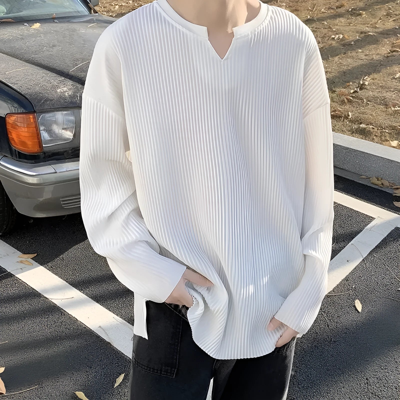 Plus size striped pullover in loose fit with long sleeves and draping design