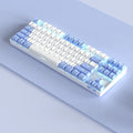 Wireless mechanical keyboard with metal frame in blue-white colour scheme showing backlit keys and USB-C charging port