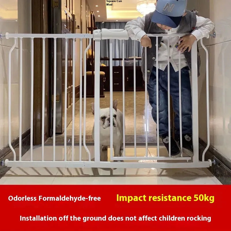 White plastic baby safety gate installed at top of stairs with 78cm height and adjustable width mechanism