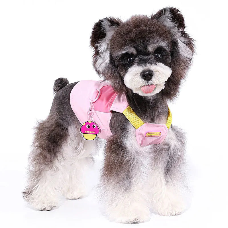 Pink dog traction vest harness for small breed dogs on a white background.