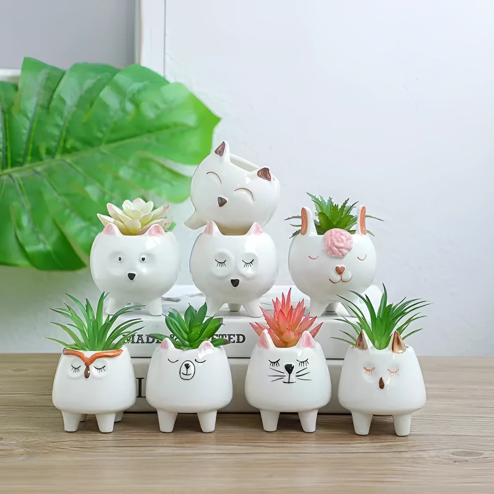 Ceramic succulent flowerpot with hand-painted cartoon animal and floral design in pastel colour
