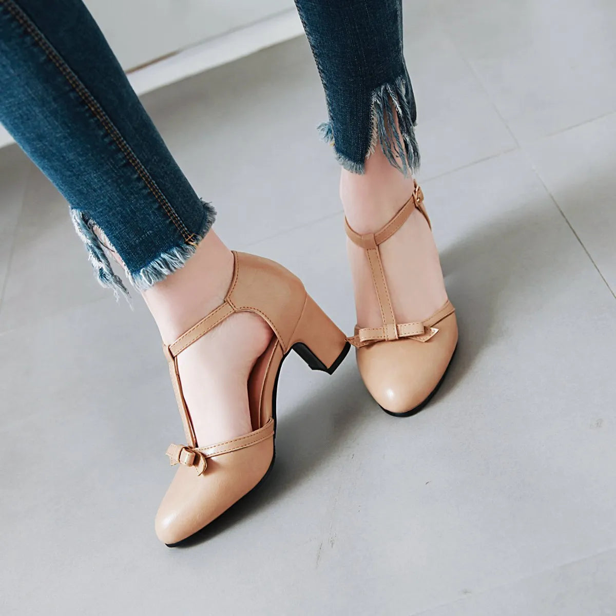 Women's chunky heel sandals with 6.5cm mid-heel, adjustable buckle strap, and round toe design in apricot colour