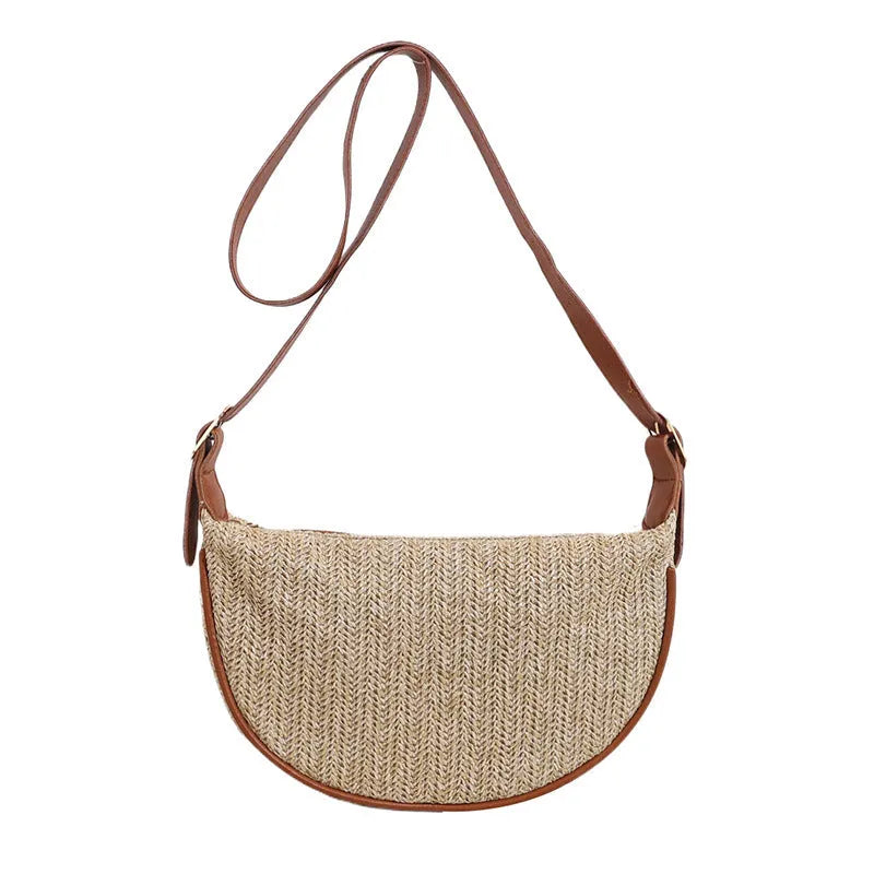 Women's woven straw crossbody bag showing internal phone and file compartments in corrugated brown colour