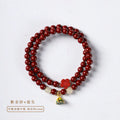 Hand-woven purple gold sand double circle bracelet with a 6mm lotus seedpod bead.