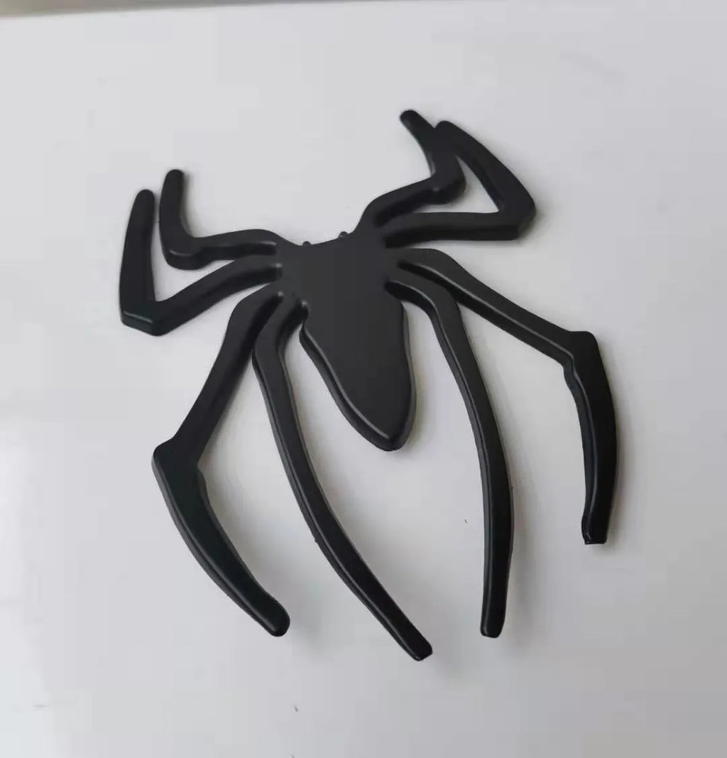 Three-dimensional metal spider bumper sticker showing raised design on zinc alloy with 7x5cm dimensions
