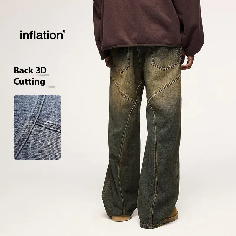 Man wearing washed vintage blue wide leg jeans with a straight leg and mid-waist cut