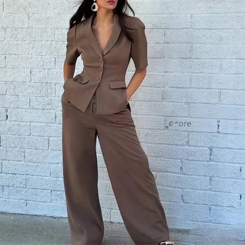 Brown polyester slim fit waist suit with trousers, showing long sleeves and tailored silhouette