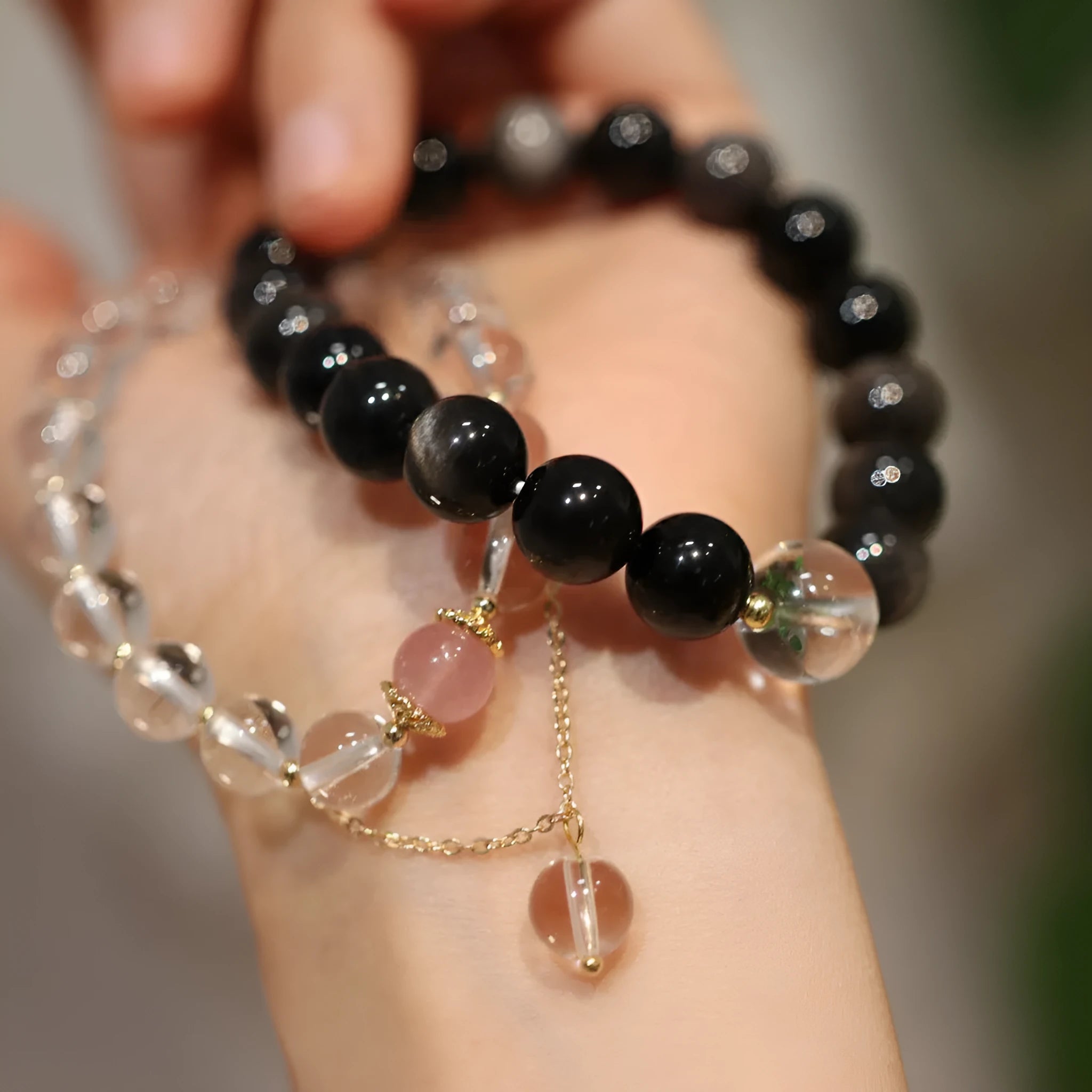 White crystal geometric bracelet with cat eye obsidian stones and Chinese auspicious patterns