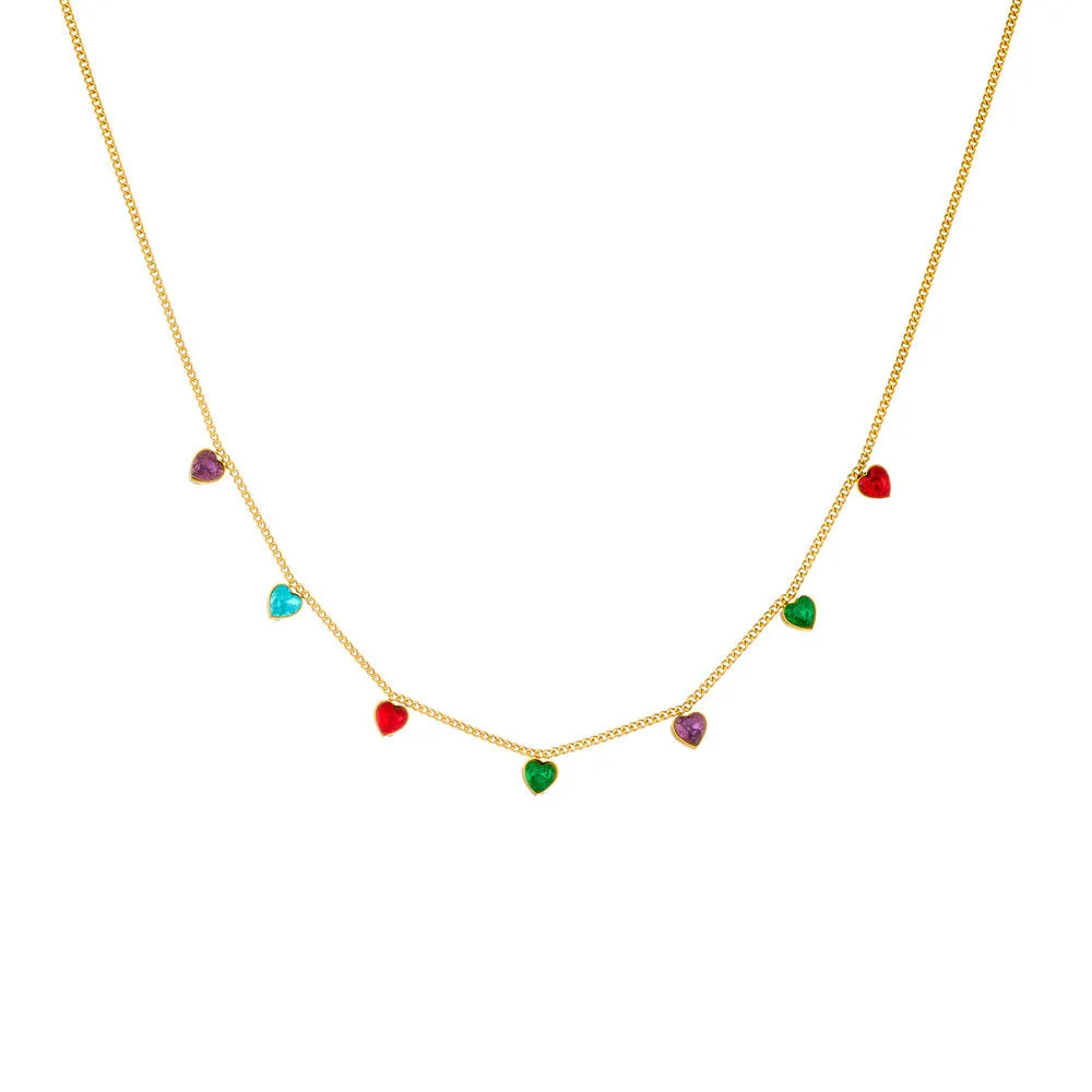 Gold-coloured stainless steel necklace with a heart pendant on an adjustable chain.