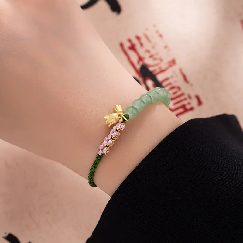 Red rope hand woven bracelet with lily flower design for women in national style