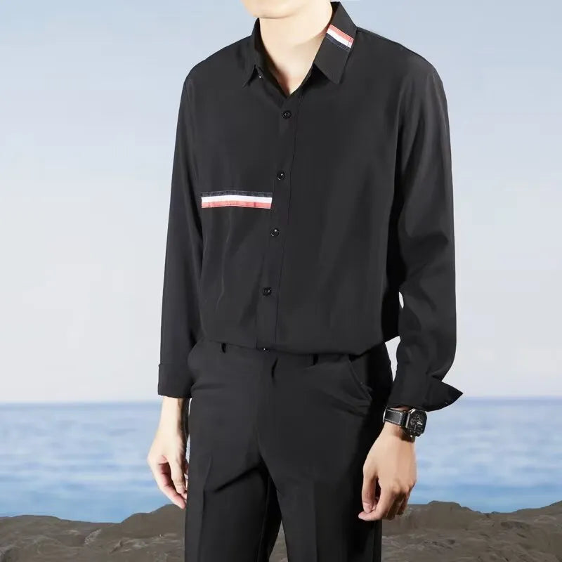 Man's loose-fit Hong Kong style cardigan shirt in a cotton blend fabric, shown in light blue.