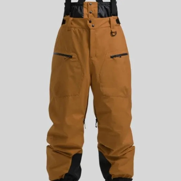 Man modelling black waterproof ski trousers with an adjustable calf strap.