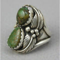Geometric turquoise ring with electroplated alloy construction showing stone setting detail