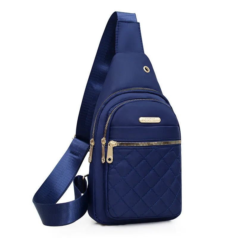 Girl's Oxford cloth crossbody chest bag in a solid colour with plaid detail