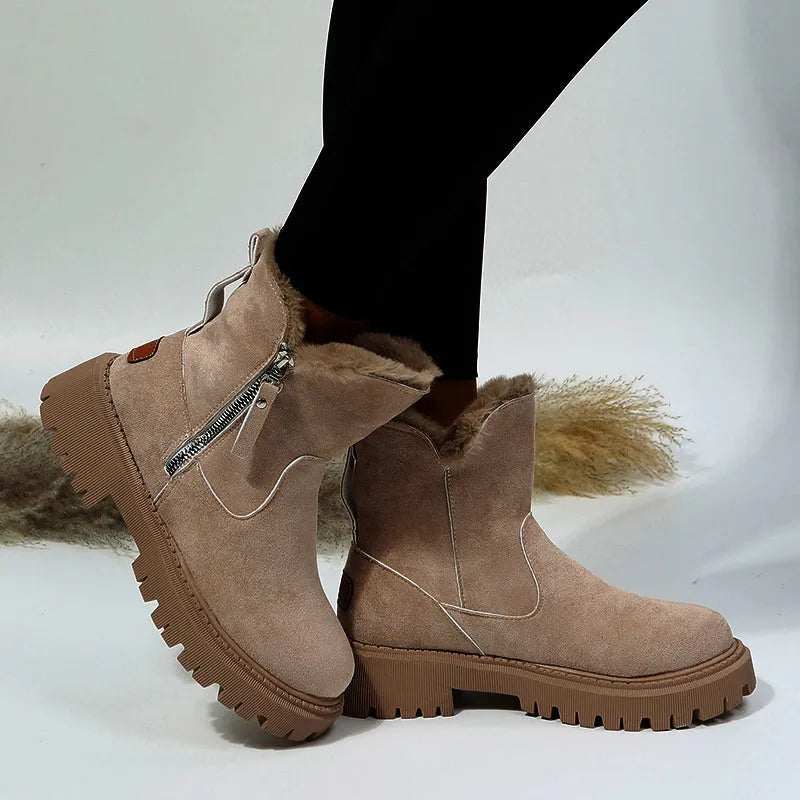 Women's black snow boots with high-top design, side zipper, and non-slip rubber sole for winter