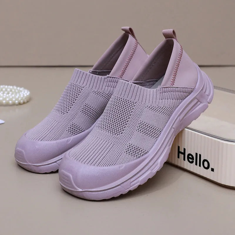 Women's black one pedal slip-on shoes with cloth upper and flat PVC sole