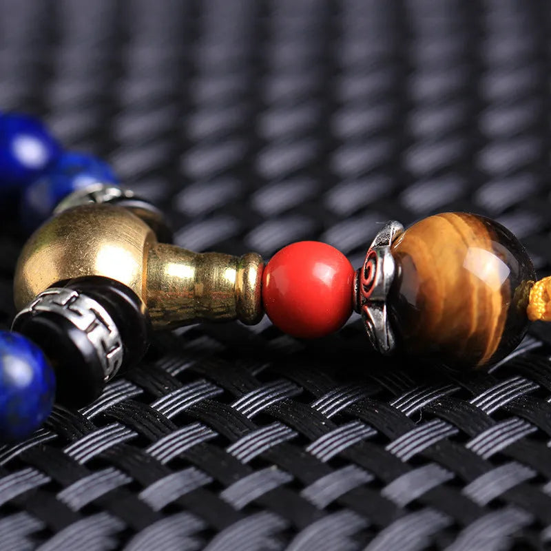 Handcrafted blue lapis lazuli 108 bead bracelet with zodiac charm