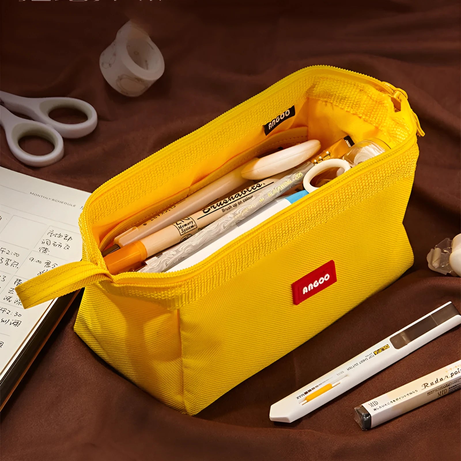 Large canvas pencil case with double zipper in yellow, black, or dark blue colour.