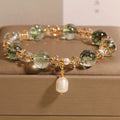 Green phantom quartz crystal bracelet with champagne accents in Japanese Korean style design
