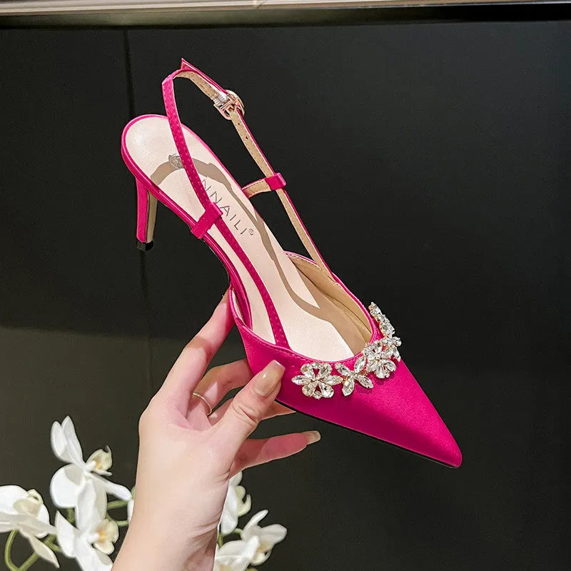Women's satin stiletto high heels with rhinestone closed toe and buckle fastening in white, rose red, or blue