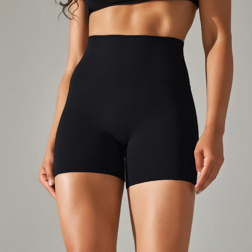 Women's high waist hip lift fitness tights in dark green, shown for sports and casual wear.