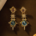 Gold geometric retro stud earrings with round shape and alloy material