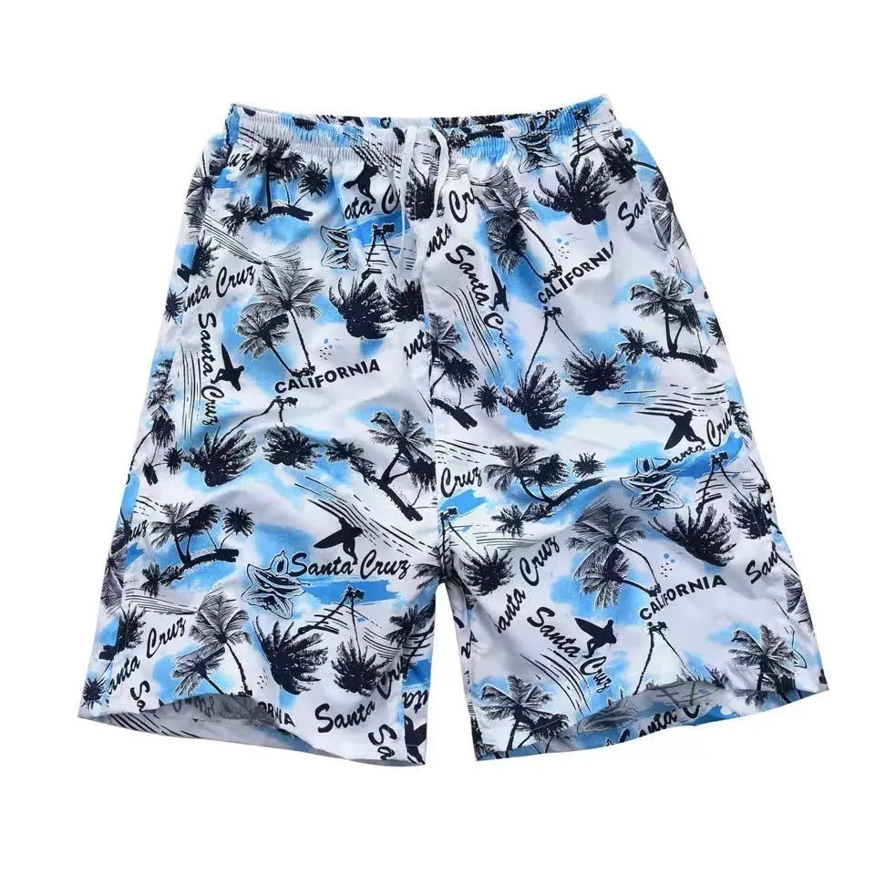 Men's floral print swimming trunks in a selection of colours on a beach background.