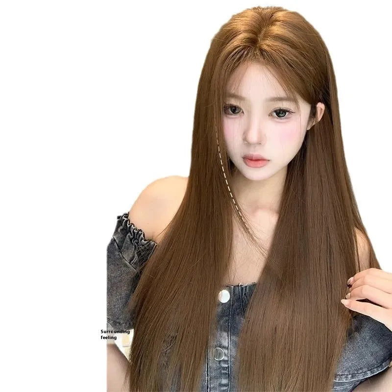 Warm brown lace front wig with centre part, side bangs and long straight synthetic hair