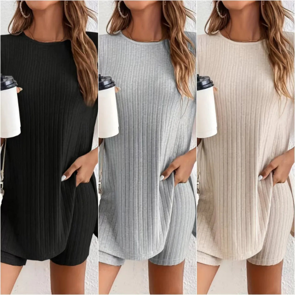 Women's black cotton two-piece shorts set with ribbed crew neck top and matching shorts on a hanger.