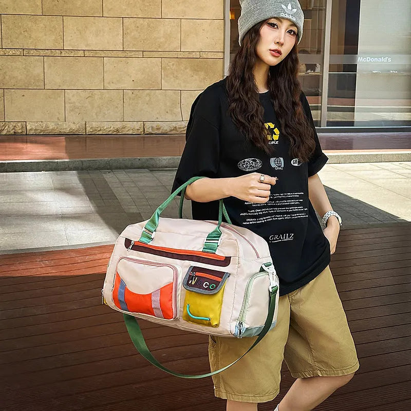Large black sports shoulder messenger bag with a khaki colour option.