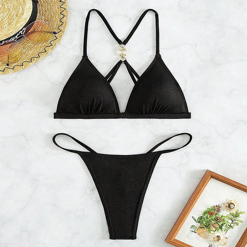 Black women's hollow backless split bikini with adjustable ties, sizes XS to L, made from 100% nylon fabric