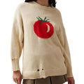 Women's acrylic jacquard pullover sweater in milky white with round neck and long sleeves, showing loose fit and textured pattern