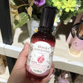Pomegranate skincare set showing six products: cleanser, water, milk, cream, essence, and eye cream.