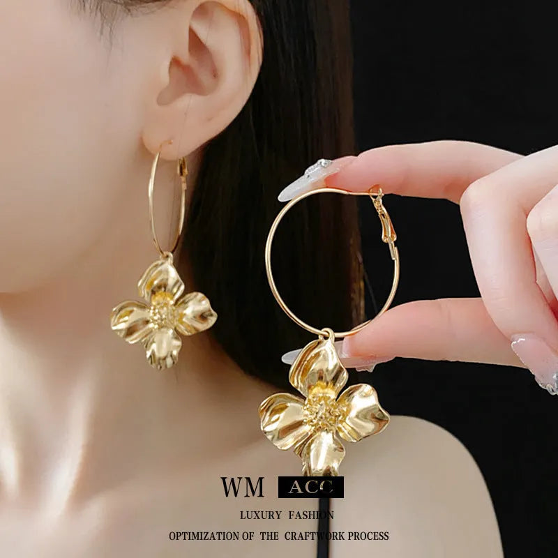 Silver needle metal flower earrings with electroplated gold or silver finish and vintage design