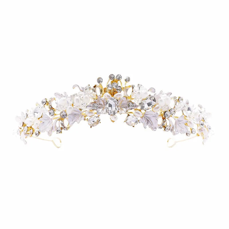 Gold and silver alloy pearl crown headdress hair accessory for women on a white background.
