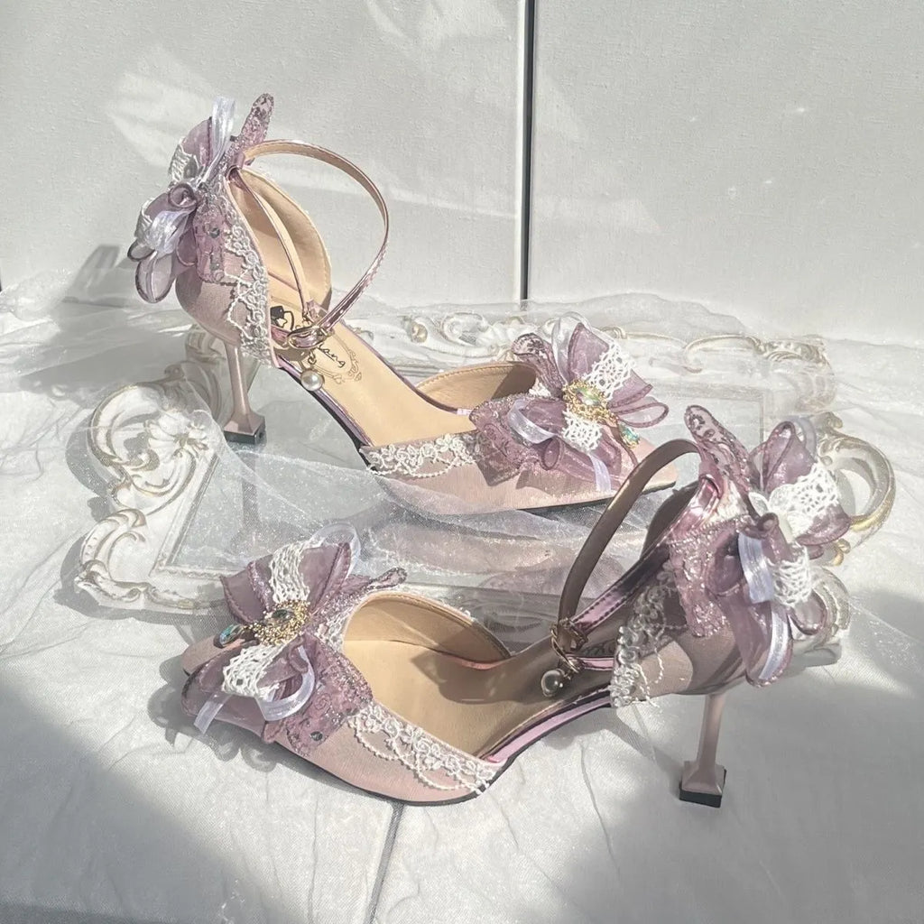 Purple satin women's wedding shoes with square toe and stiletto heel on white background