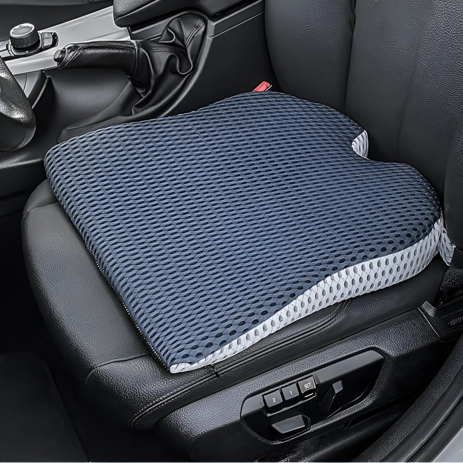 Memory foam car cushion with strap attachment in black, grey and milky white colours