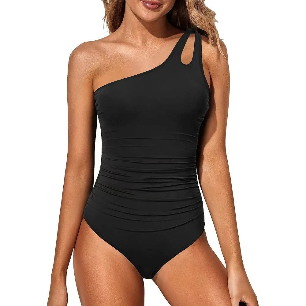 Women's solid colour one-piece swimsuit in nylon fabric shown in multiple colour options