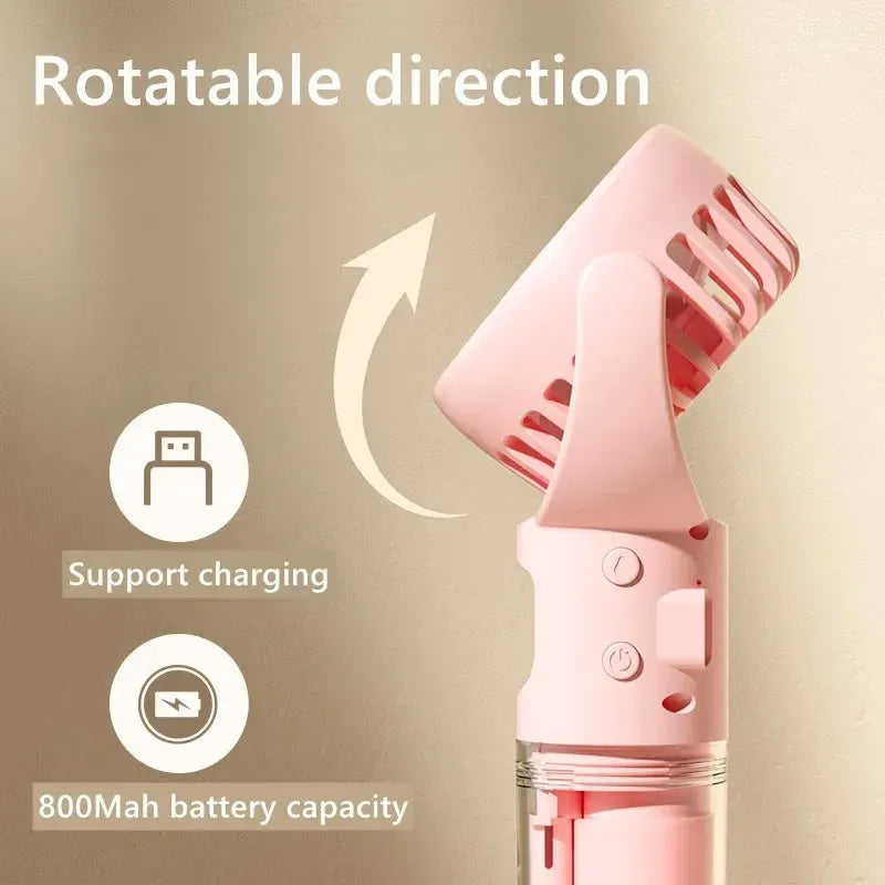 Handheld portable mist fan in various colours with transparent water tank and control button.