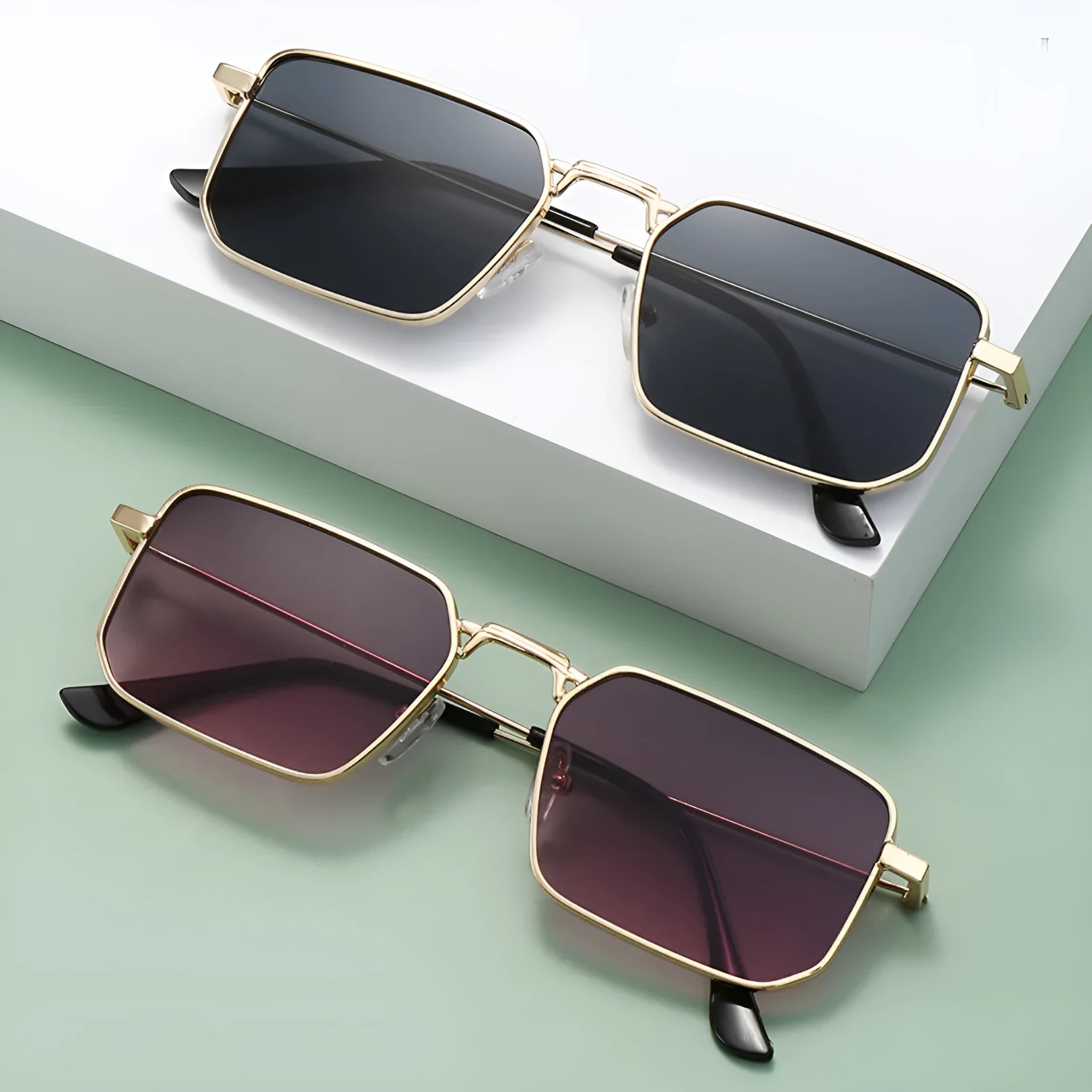 Men's square steampunk sunglasses showing gold frame with grey lenses and black frame option.