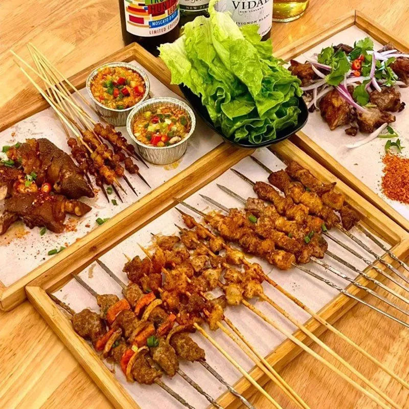 Square bamboo serving tray with brown handle for barbecue and hospitality use